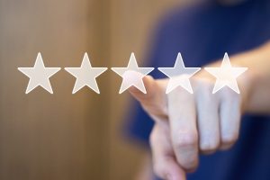 Businessman presses button key rating increase on virtual digital electronic user interface.