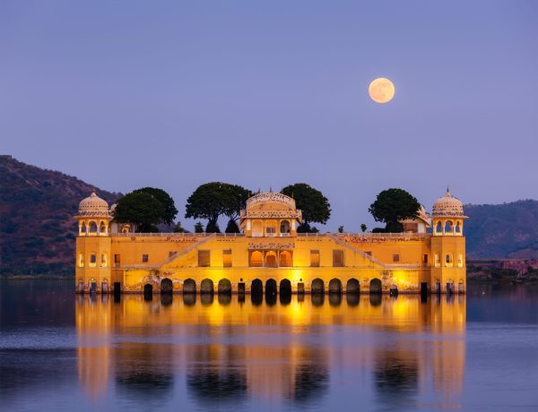 Jal Mahal (Water Palace).  Jaipur, Rajasthan, India Rajasthan landmark - Jal Mahal (Water Palace) on Man Sagar Lake in the evening in twilight.  Jaipur, Rajasthan, India