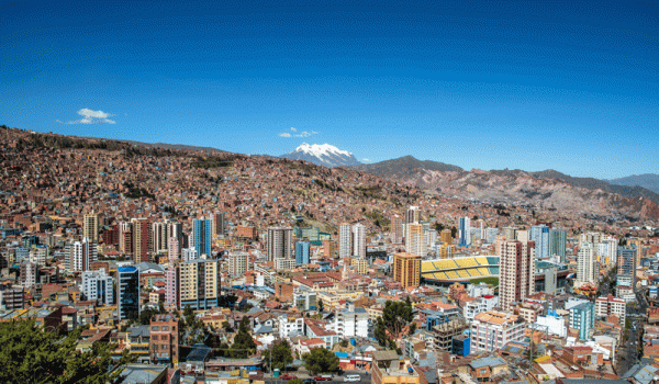 ridi-aerial-view-of-la-paz-with-illimani-mountain-on-ba-2025-03-27-02-00-47-utc ridi-aerial-view-of-la-paz-with-illimani-mountain-on-ba-2025-03-27-02-00-47-utc