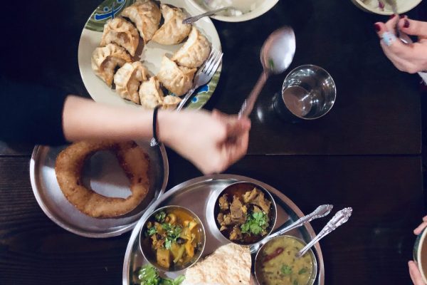 GASTRONOMIA a-group-of-friends-eating-tibetan-food-2024-05-13-05-33-22-utc