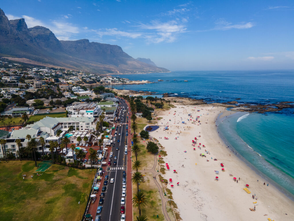 View from The Rock viewpoint in Cape Town over Campsbay, view over Camps Bay with fog over the ocean. fog coming in from ocean at Camps Bay Cape Town
